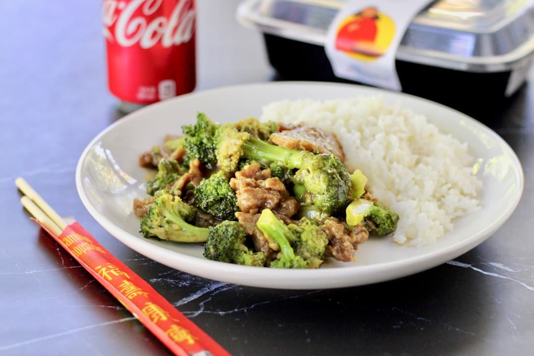green broccoli on white ceramic plate