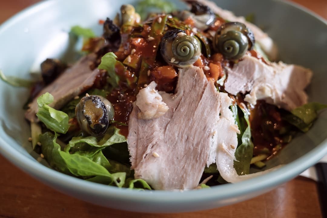 A salad dish is displayed in a bowl.