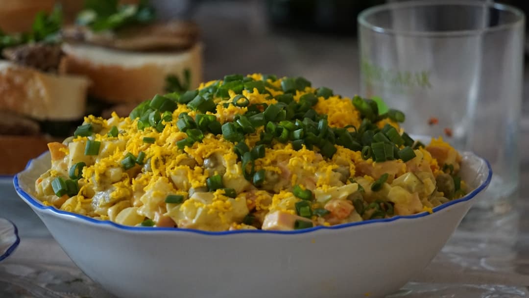 A delicious salad garnished with fresh chives.